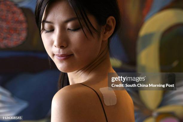 The contraceptive patch EVRA patch - available only with a doctor's prescription - is introduced in Hong Kong, with models showing how to use it, at...