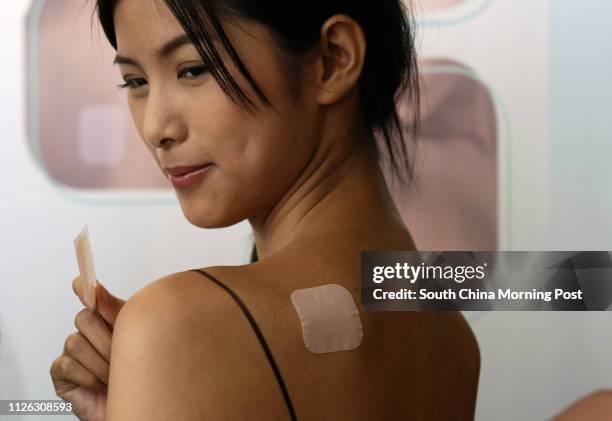 The contraceptive patch EVRA patch - available only with a doctor's prescription - is introduced in Hong Kong, with models showing how to use it, at...