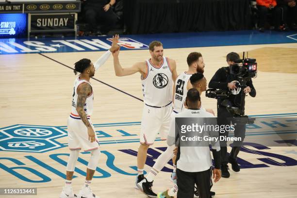 Angelo Russell and Dirk Nowitzki of Team Giannis high five against Team LeBron during the 2019 NBA All-Star Game on February 17, 2019 at the Spectrum...