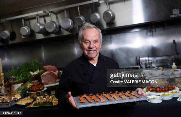 Celebrity Chef Wolfgang Puck poses in the kitchen while preparing the diner for the 91st annual Academy Awards Governors Ball, in Hollywood,...