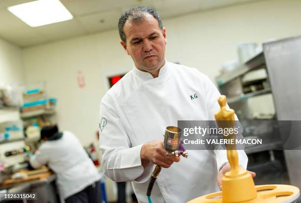 Pastry chef Kamel Guechida poses in the kitchen while preparing the diner for the 91st annual Academy Awards Governors Ball, in Hollywood,...