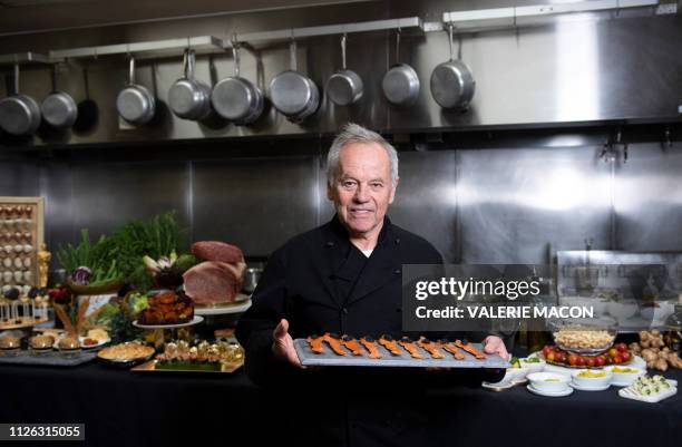 Celebrity Chef Wolfgang Puck poses in the kitchen while preparing the diner for the 91st annual Academy Awards Governors Ball, in Hollywood,...