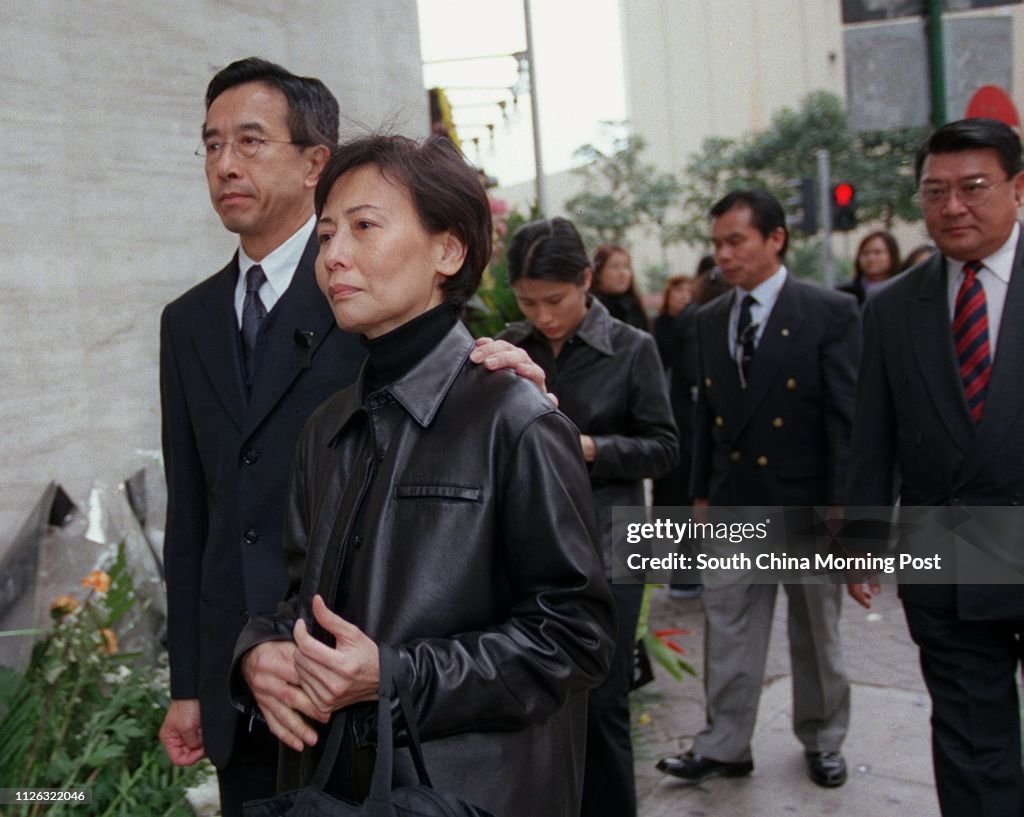 James Tien Pei-chun (L) and his wife Mary leave Hong Kong Funeral Home , North Point , after the funeral for Grace Tien Chia-weng , widow of Dr Francis Tien Yuan-hao and mother of Liberal Party leader James Tien Pei-chun and Kowloon-Canton Railway Corpora