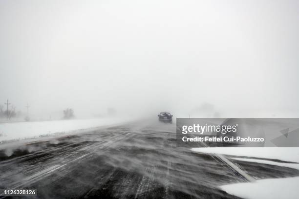 snow storm on the i-94 near harwood, north dakota, usa - blizzard bildbanksfoton och bilder