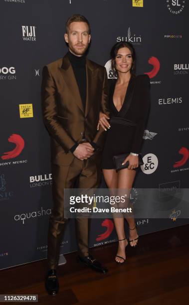 Calvin Harris and Aarika Wolf attend The BRIT Awards 2019 Sony after party at Aqua Shard on February 20, 2019 in London, England.