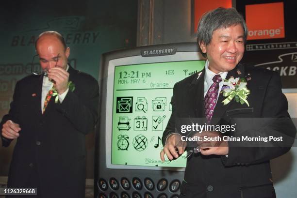 James Balsille , Chairman of Research In Motion , and Canning Fok Kin-ning , Group Managing Director of Hutchison Whampoa Limited , at the launch of...