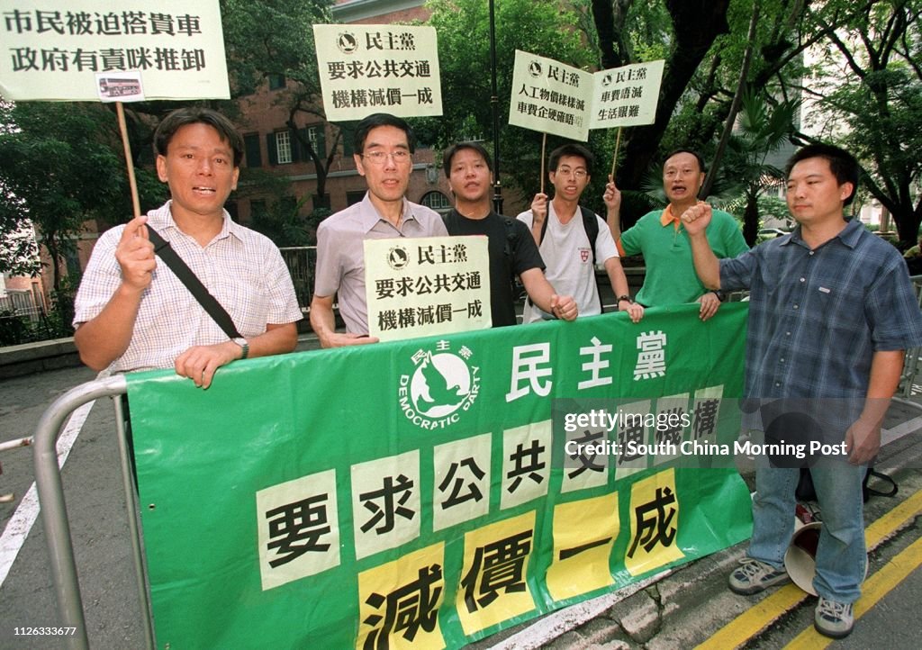 Members of the Democratic Party petition to Sarah Liao Sau-tung , Secretary for Environment, Transport and Works for lower public transport fares at Central Government Offices.