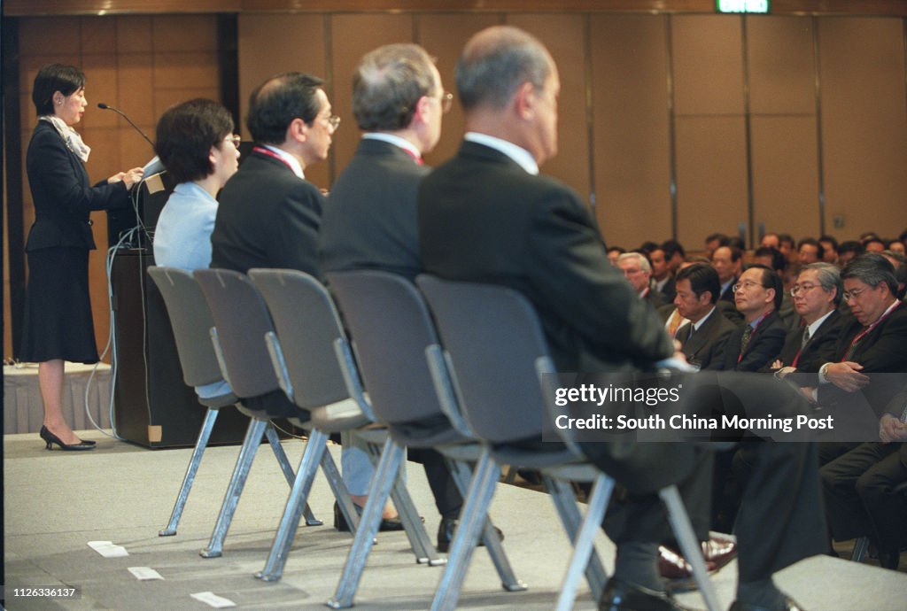 Secretary for the Environment, Transport and Works Sarah Liao Sau-tung (far left), speaks at the opening of the Better Air Quality Conference 2002 at the Hong Kong Convention and Exhibition Centre. 16 December 2002