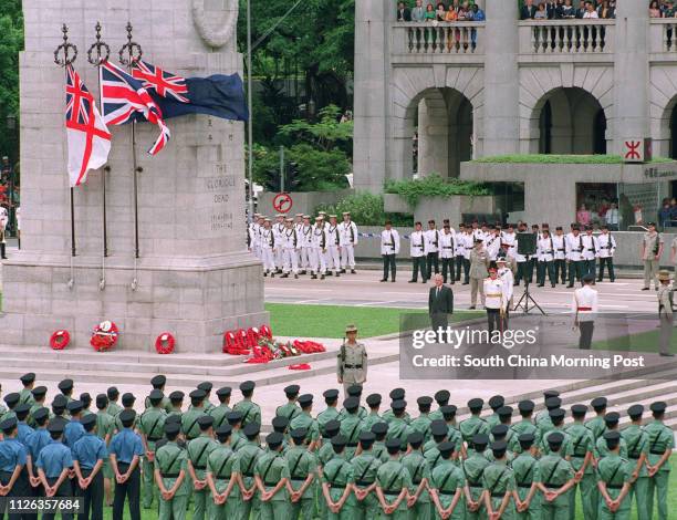 LIBERATION DAY PARADE AT THE CENOTAPH, GOVERNER CHRIS PATTEN LAYS A WREATH.