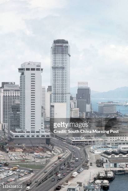 Looking from Harcourt Road to Central. The tallest building is the Connaught Center , Mandarin Hotel is behind it, while the adjection two are the...