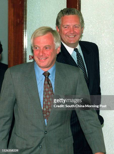 BRITISH MINISTER JEREMY HANLEY WHO ARRIVED FOR A FIVE-DAY VISIT AT THE AIRPORT WITH CHRIS PATTEN. GOVERNOR PATTEN GREETS