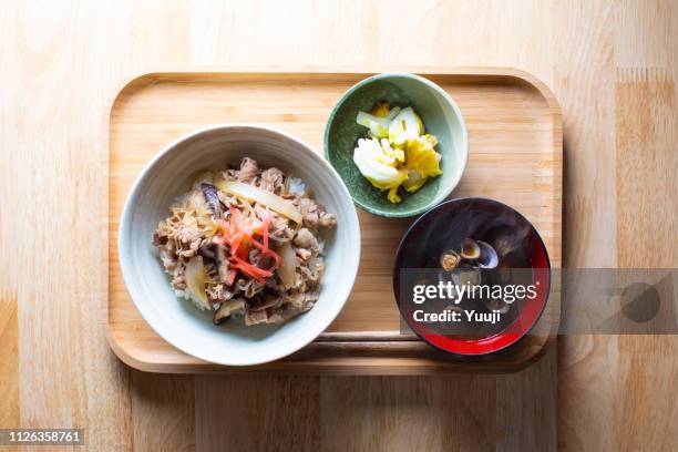 breakfast and lunch with rice and side dishes unique to japan placed on the tray. we eat with cooked rice as our staple food. - miso soup stock pictures, royalty-free photos & images