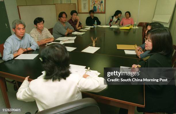 Unionist Leung Yiu-chung and unidentified Tom Lee Music staff representatives meet with employer representatives about the company's plan to skip...