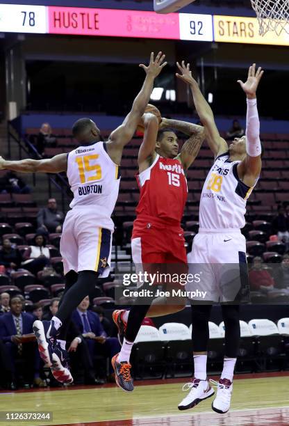 LaQuinton Ross of the Memphis Hustle passes the ball against Deonte Burton of the Salt Lake City Stars during an NBA G-League game on February 20,...