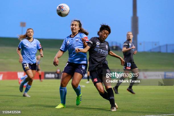 Danielle Colaprico of Sydney FC competes for the ball with Yukari Kinga of Melbourne City during the round 14 W-League match between Sydney FC and...