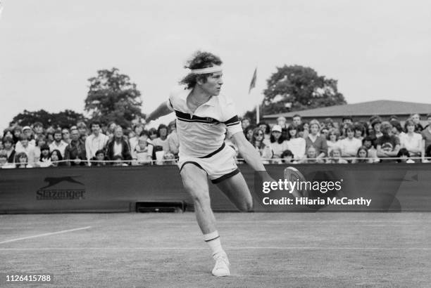 American tennis player John McEnroe in action at Wimbledon Championships, All England Lawn Tennis and Croquet Club, London, UK, 30th June 1981.