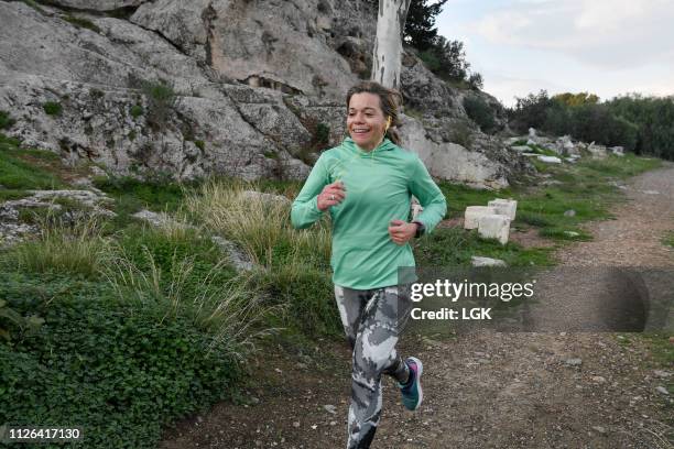 Woman running  in a city park