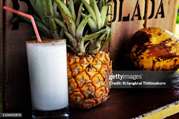 the piña colada cocktail. - pina colada stock pictures, royalty-free photos & images