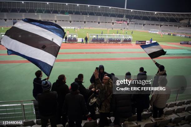 Paris supporters arrive to watch the French L2 football match between FC Paris and Ajaccio at the Charlety Stadium on February 15, 2019 in Paris.