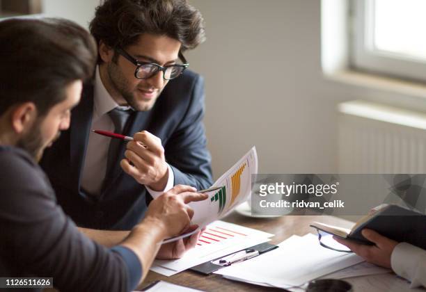 business people meeting planning strategy analysis concept laptop meeting with technology - financials stock pictures, royalty-free photos & images