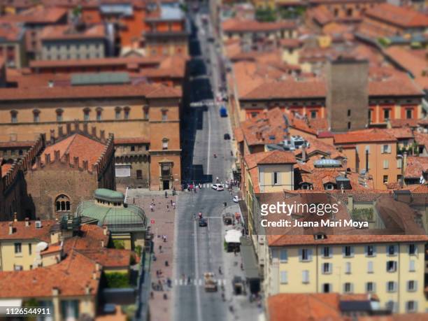 view of a street in bologna, (italy) from the asinelli tower - personas ciudad stock pictures, royalty-free photos & images