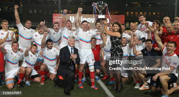 Russia Squad win the game of USTINOV Cup 2014 with Pieter Schats , HKRFC chairman and Ekaterina Bogucharskaya , vice-consul of the Consulate General...