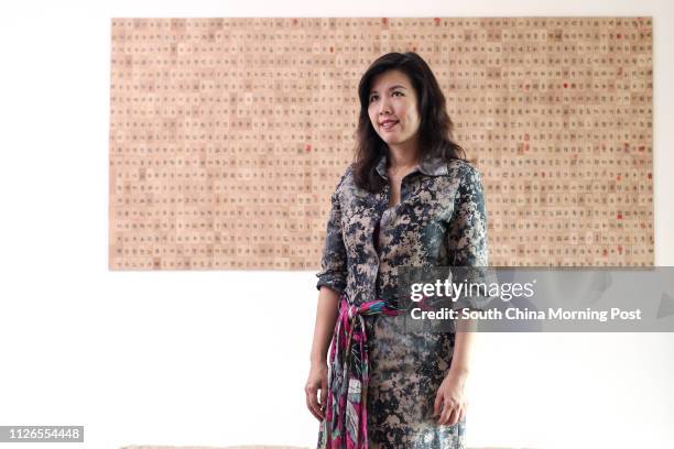 Carol Man Wing-yan, who converted to Judaism. She does cross cultural art, draws Hebrew script in the style of Chinese calligraphy, poses for a...