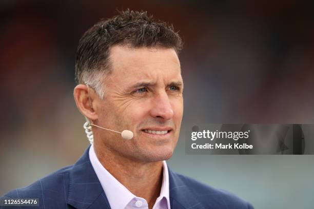 Fox Cricket commentator Michael Hussey watches on as he presents in the pre-match before play on day one of the Second Test match between Australia...