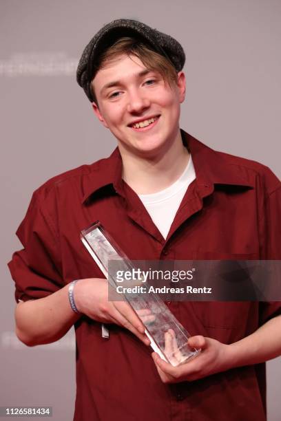 Michelangelo Fortuzzi pose his awards as best newcomer during the German Television Award at Rheinterrasse on January 31, 2019 in Duesseldorf,...