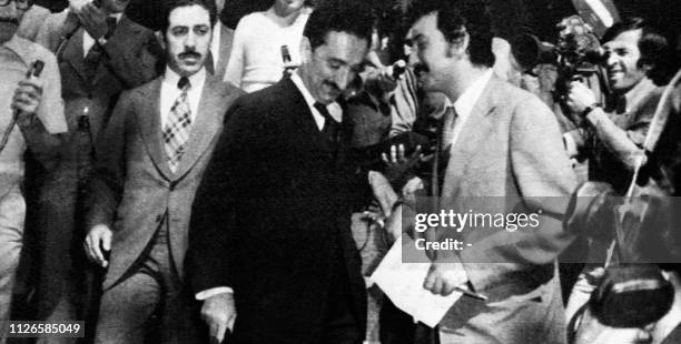 Turkish Prime Minister Bulent Ecevit answers to a journalist after the end of negociations in Geneva on August 14, 1974. Two conferences in Geneva...