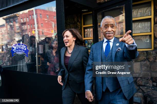 Democratic presidential candidate Sen. Kamala Harris and Rev. Al Sharpton exit after having lunch at Sylvia's Restaurant in Harlem, February 21, 2019...