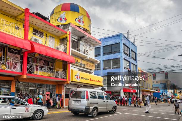 colorful businesses in downtown montego bay jamaica - montego bay stock pictures, royalty-free photos & images