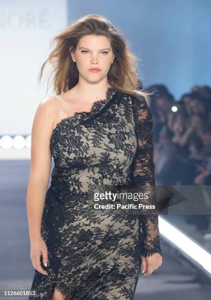 Model wearing dress by Monique Lhuillier walks runway for 11 Honore fashion show during Fall/Winter New York Fashion Week at Spring Studios.