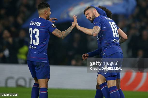 Chelsea's French striker Olivier Giroud celebrates with teammates after scoring the opening goal of the UEFA Europa League round of 32, 2nd leg...