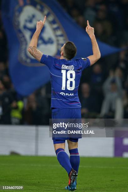 Chelsea's French striker Olivier Giroud celebrates after scoring the opening goal of the UEFA Europa League round of 32, 2nd leg football match...