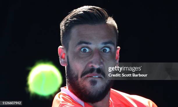 Damir Dzumhur of Bosnia / Herzegovina watches the ball as he plays a shot during his rubber 1 singles match against John Millman of Australiaduring...