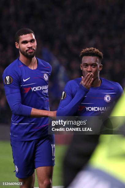 Chelsea's English midfielder Callum Hudson-Odoi celebrates with Chelsea's English midfielder Ruben Loftus-Cheek after scoring their third goal during...