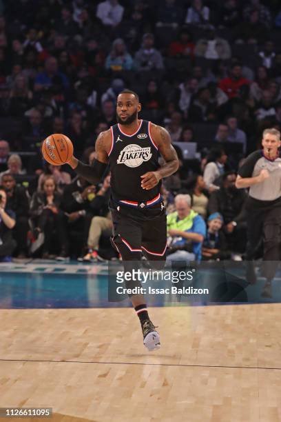 LeBron James of Team LeBron handles the ball against Team Giannis during the 2019 NBA All-Star Game on February 17, 2019 at the Spectrum Center in...