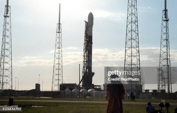 SpaceX Falcon 9 rocket stands ready for launch on February 21, 2019 at pad 40 at Cape Canaveral Air Force Station in Florida. The rocket's payload...