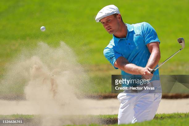 Byron DeChambeau of United States plays a shot from the 1st tee during the first round of World Golf Championships-Mexico Championship at Club de...