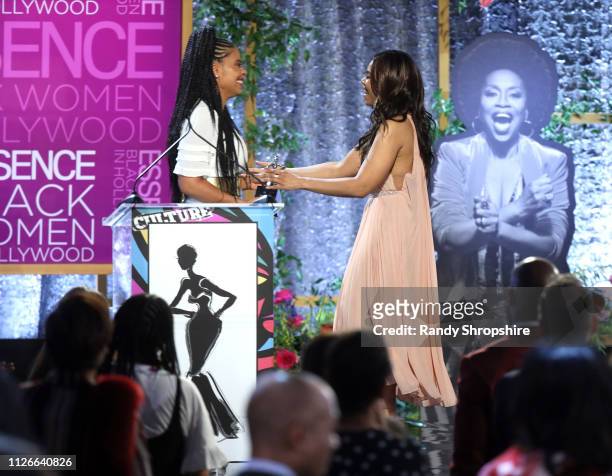 Sanaa Lathan and Honoree Regina Hall speak onstage during the 2019 Essence Black Women in Hollywood Awards Luncheon at Regent Beverly Wilshire Hotel...
