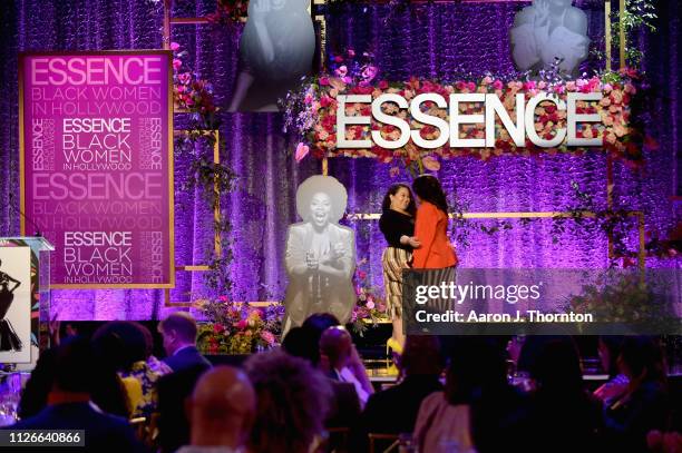 Dee Guerrero and Regina King speak onstage during the 2019 Essence Black Women in Hollywood Awards Luncheon at Regent Beverly Wilshire Hotel on...