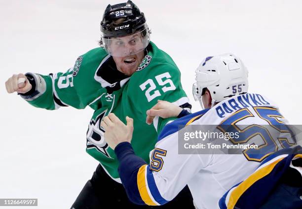 Brett Ritchie of the Dallas Stars fights with Colton Parayko of the St. Louis Blues in the second period at American Airlines Center on February 21,...