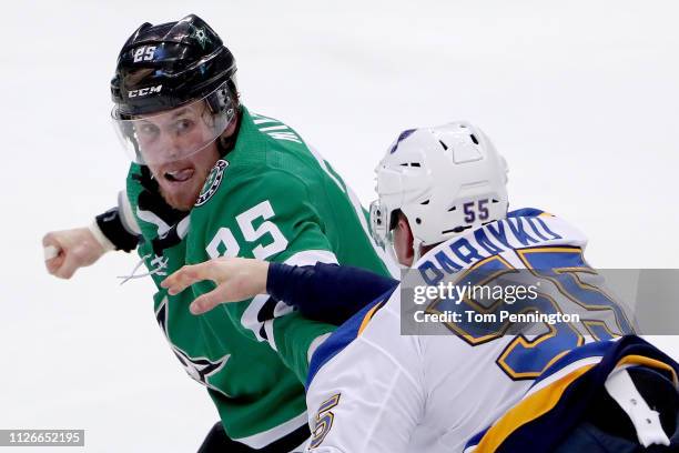 Brett Ritchie of the Dallas Stars fights with Colton Parayko of the St. Louis Blues in the second period at American Airlines Center on February 21,...