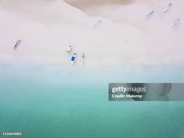 aerial view on small fisher boats on the beach. - isla holbox stock-fotos und bilder