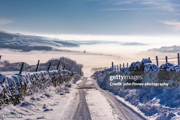 country lane in winter near sparrowpit, derbyshire, peak district. uk - peak district national park bildbanksfoton och bilder