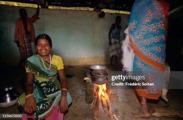 Muria People in Chhattisgarh State. Young Muria at the entrance of a gothul, a dormitory where boys and girls sleep, work, mingle and experiment with...