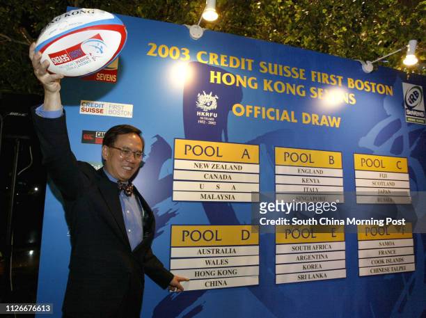 Chief Secretary Donald Tsang Yam-kuen officiates the official draw for the 2003 Credit Suisse First Boston Hong Kong Sevens at Exchange Square in...