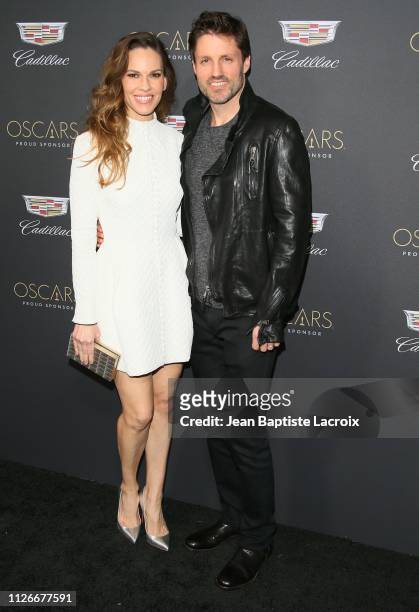Hilary Swank and Philip Schneider attend Cadillac celebrates the 91st Annual Academy Awards on February 21, 2019 in Los Angeles, California.