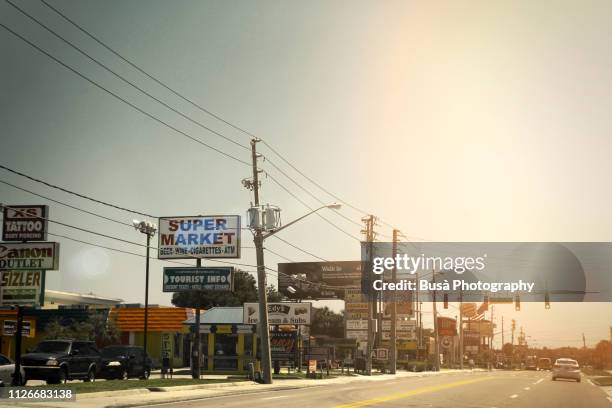 roadway in orlando, florida, usa - orlando florida buildings stock pictures, royalty-free photos & images